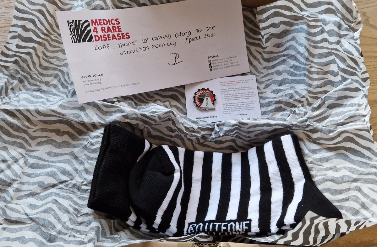 Mystery parcel arrived today after we weren't in to receive it yesterday.. It's only a lovely package from @M4RareDiseases with some stripey socks and a pin badge 😍 Love the zebra print wrapping paper! #rare #daretothinkrare #PCD