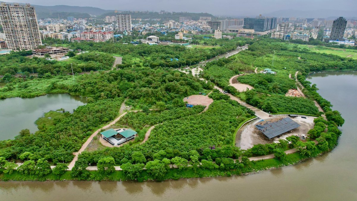 Greenyatra's tweet photo. A Nature’s abode in concrete Jungle

#JewelofNaviMumbai, Nerul - Urban India’s Largest #MiyawakiForest 

Project Age: 16-17 months 

Please visit it with your family and friends to experience it.
#WhatYou Will Get there:
· It’s home 130,000+ saplings of 60+ Local #NativeSpecies of Medicinal, Ayurvedic, Fruits, Flowers, Vedic and Social values.
· 30 acres+ Urban Forest with 70+ acres water body
· #Biodiversity Hub; attracting 100+ species birds, butterflies, honey bees, small reptiles, bumble bees, centipedes’ millipedes.
· Around 20 Forest Patterns
· Fresh Oxygen Center

#Amenities You Can Enjoy:
 · Approx. 3km cycling and walking track.
· Urban Forest walk Pathways
 · 2 Yoga and meditation zone
 · Children Play area.
 · 4 multipurpose open play spaces
 · Different types of pathways
 · Open green lawn sitting area.
 · Betel nut and Mango Garden and much more 

 How To Reach:
Google Location: https://t.co/LzaSBGiL9o

Thank you, @NMMConline and @NMMCCommr for all the supports and special thanks to our #CSR partners @DCBBank @AxisBank @CreditSuisse @CP_News @ONGC_ @Barclays to make this project a reality.

Special thanks to Mr. @abhijitbangar, current Municipal commissioner for granting permission of this massive site and fast track administrative support. 

@CIDCO_Ltd @CMOMaharashtra
@Dev_Fadnavis @mieknathshinde
@MahaEnvCC @MoJSDoWRRDGR @PMOIndia
@richapintoi @moefcc @SwachhBharatGov
@MoHUA_India @amrut_MoHUA @sini_shetty 
@dwnews @haldilal @NM_Infra