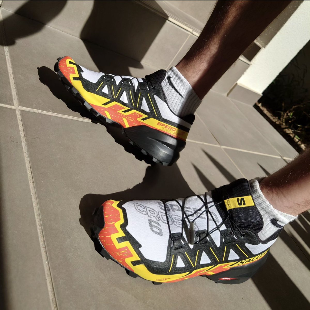 willspilsbury's tweet photo. The wildcard pair have been revealed! 👊🏻😈 Salomon Speed Cross 6! With treads that will rip anything apart. 😆👌🏻 #newkicks #firstouting #allterrain #speedcross6 #whitesocks #nikesocks #legsout #puertoricoday https://t.co/MyajtLFiDZ