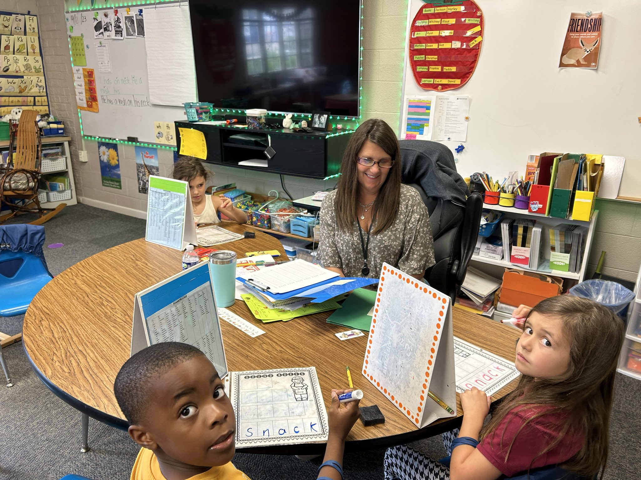 Ms. Wyatt works with spelling groups in first grade