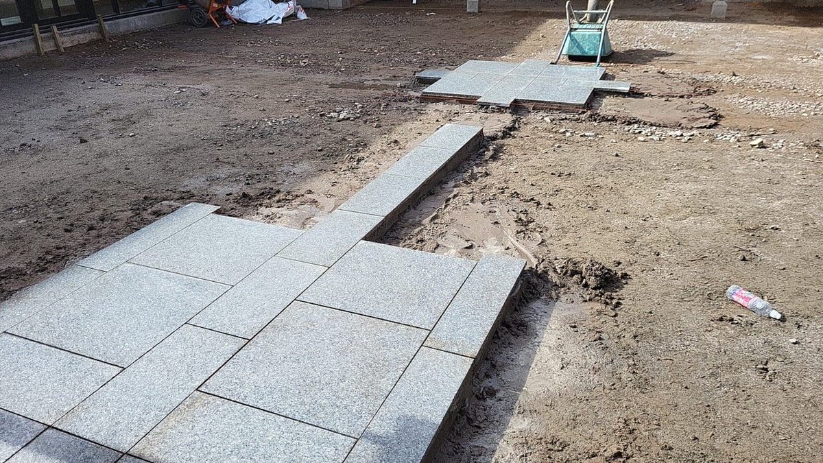Progress pics of a project at Hillview Church in Cults. A new courtyard is being installed using Marshalls’ granite eclipse paving and resin bound gravel. Natural borders with shrubs will soften the space and transform the front of this church. #landscapegardening #cults