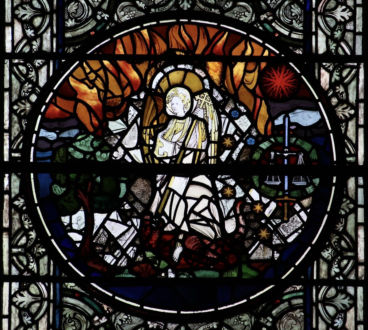 #Michaelmas 

A dramatic depiction of St Michael for the Feast of St Michael and All Angels! This is one recreated from #Medieval #StainedGlass fragments @York_Minster, I love the apocalyptic sky of flames behind the angel, emphasised by the falling stars. 

#StainedGlassEveryday