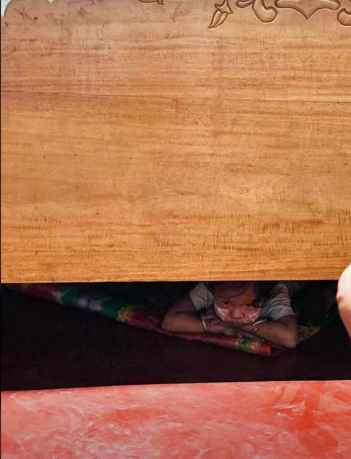 RojenTweet's tweet image. A little girl was seen hiding under her bed after security forces started entering houses and started firing tear gas, mock bombs etc. towards houses in imphal. 

#ProtectArticle19  #SaveRight2Protest #SaveManipur #KukiNarcoTerrorists #KukiAtrocities