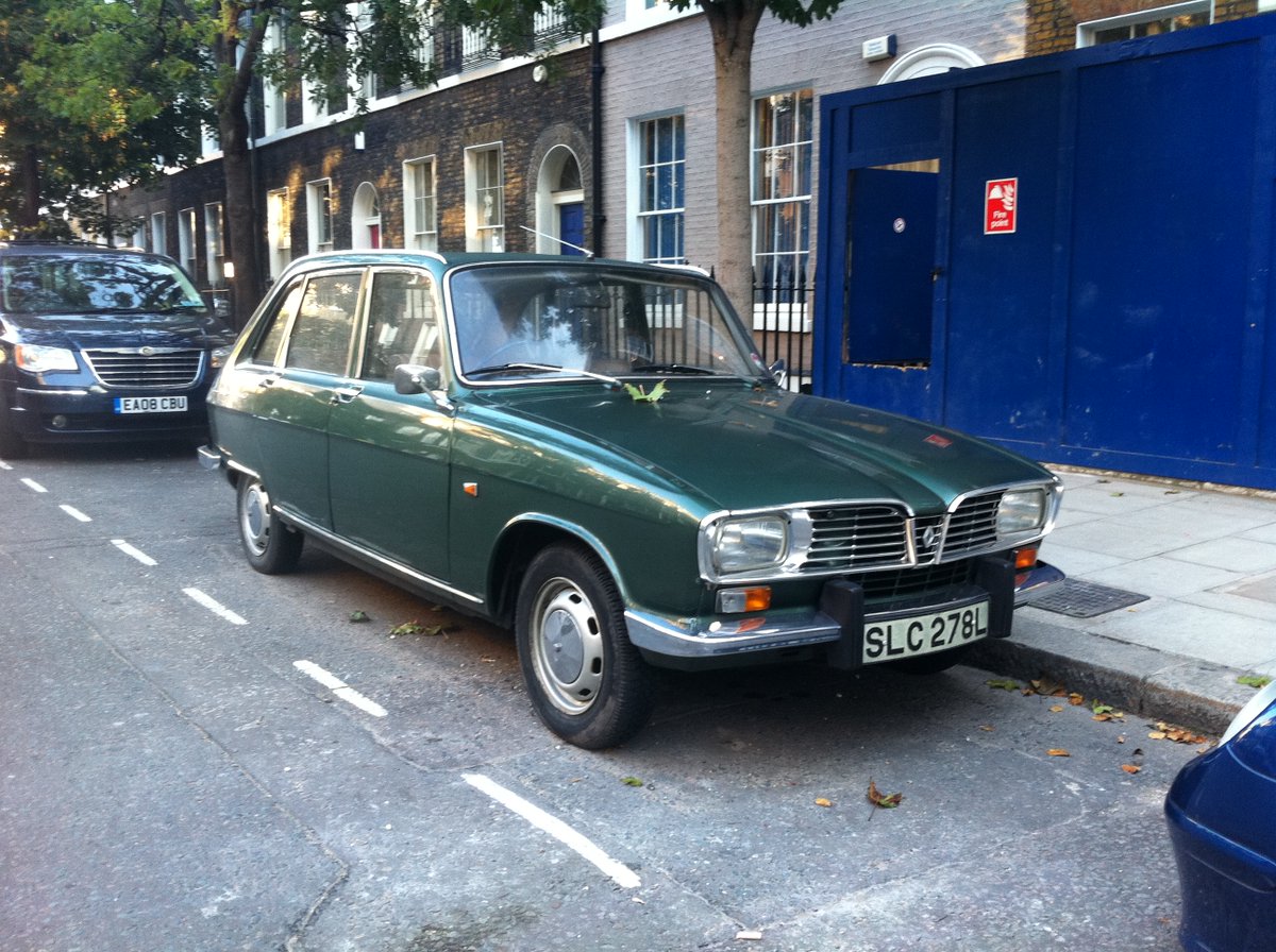 flaneurUK's tweet photo. From the archive: 29 September 2011 in London: Matching green classics - Honda 600 and Renault 16. Not bad for midweek street parking #streetspots! https://t.co/b42HZFN4xk