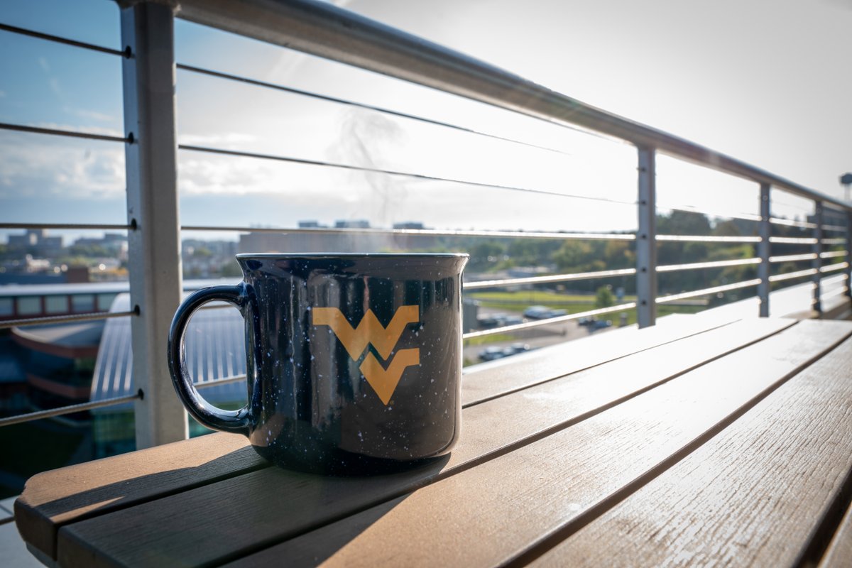 WestVirginiaU's tweet photo. Coffee, with a view. No better way to celebrate National Coffee Day. ☕️

What is your go-to coffee order? 🤔 https://t.co/sIJ6phrLKi