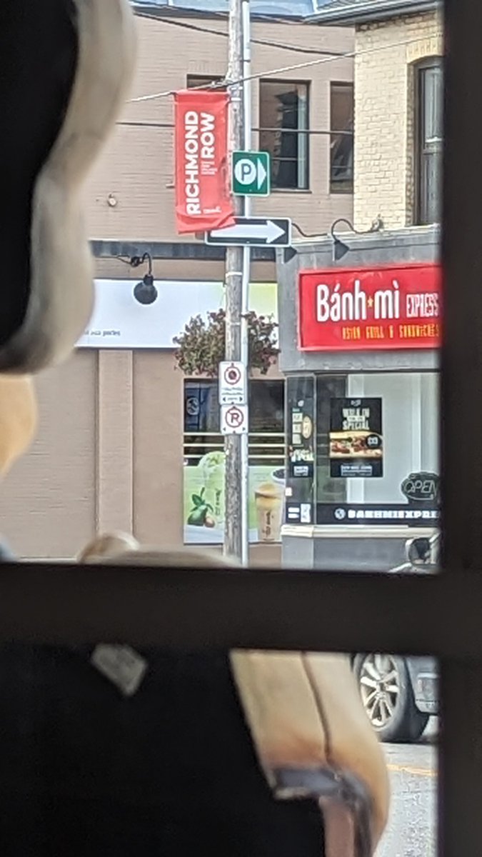 ScottatEmpyrean's tweet photo. Yay! New @Downtown_London banners are up on Richmond Row (as I scarf down some lazy Friday breakfast at Campus HiFi)  #getDTL https://t.co/2wqavFPRjj