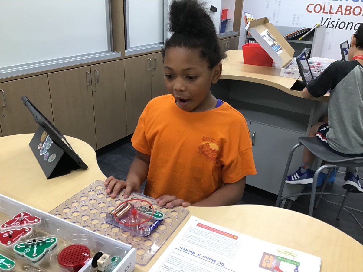 I love the pure joy, excitement, and concentration on this student’s face.