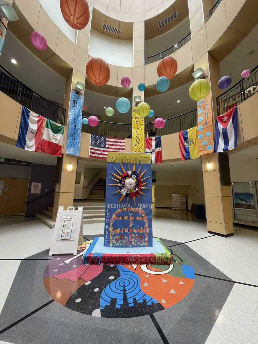 DEI_Specialist's tweet image. Awesome morning at @APSKenmore! I enjoyed being part of a productive CLT meeting with the 6th grade floor, and loved seeing this colorful display for Hispanic Heritage Month! @DEI_APS #APSHHM