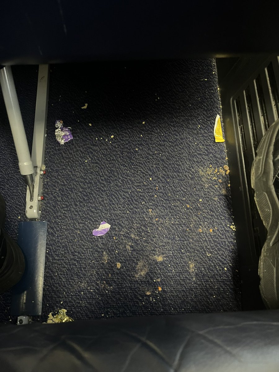 kazzamclaughlin's tweet photo. Don’t even want to put my feet under the seat never mind my bag 🙃 @Ryanair cleaning staff have early finishes on a Friday do they? https://t.co/Z3tCtdT7ao