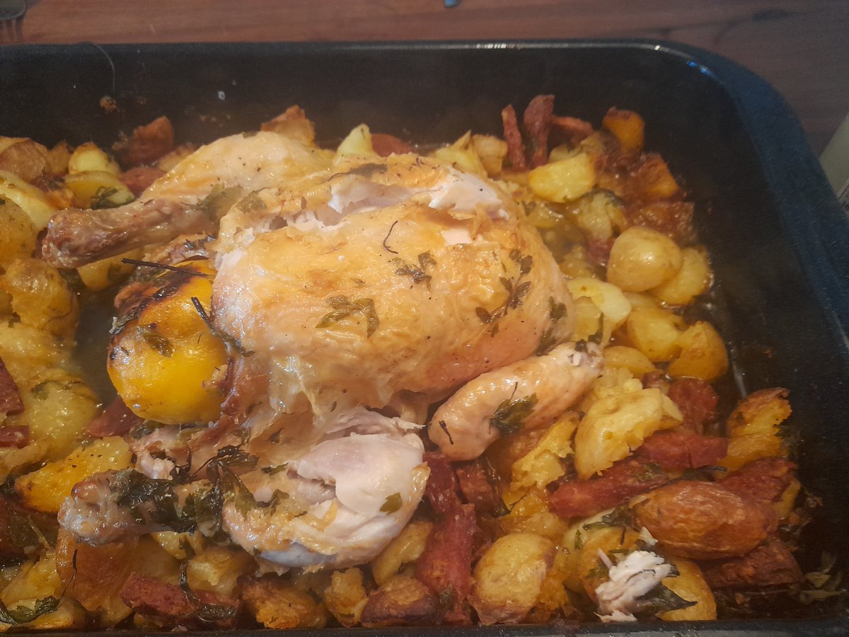Ovenbaked chicken with citron stuffing. And potatoes and chorizo sausages as side diss also ovenbaked. Made it myself