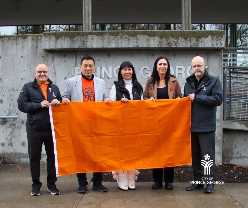 CityofPG's tweet photo. Sept. 30 marks the #NDTR2023 and #OrangeShirtDay. A public ceremony is planned for 2 pm at Lheidli T'enneh Memorial Park.

An orange flag is flying at City Hall to honour Survivors of residential schools and the children who never returned home, their families, and communities. https://t.co/cDQyh7RKUB