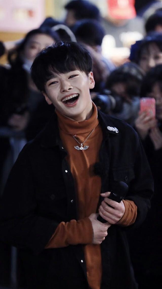 Jeongin smiling, but he gets older as you continue to scroll 
— a thread