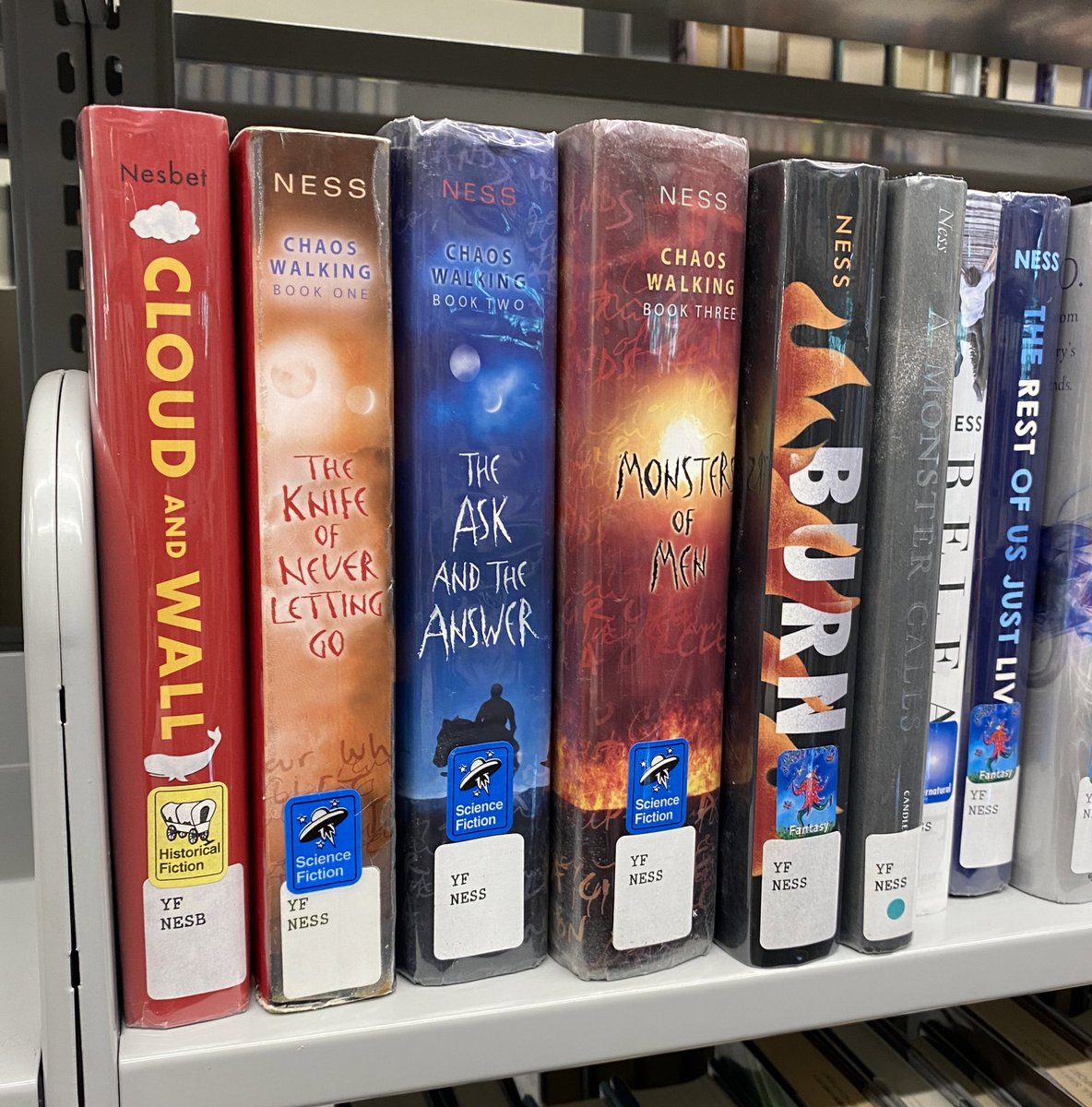 Any other librarians not able to control themselves when they see a series out of order in a library they are visiting?  Fixed it. 🤪 Too much of a @patrick_ness fan to let that slide…