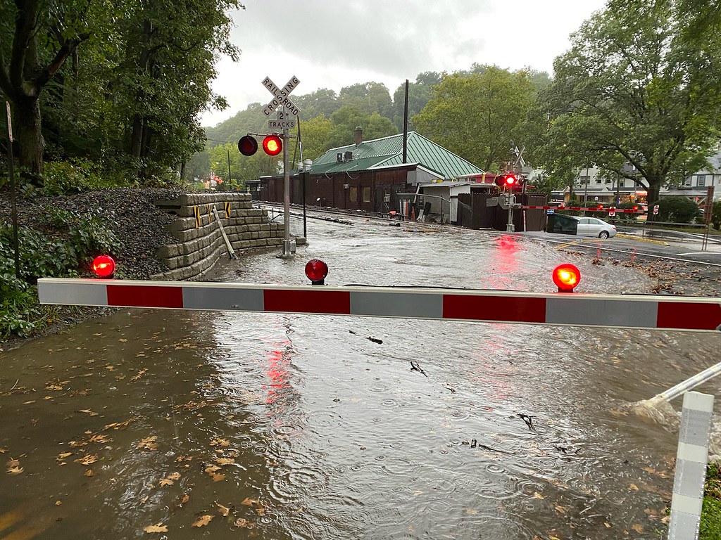 MetroNorth's tweet photo. Today's rainstorm flooded our tracks and grade crossings throughout The Bronx and lower Hudson Valley.

Service has resumed on all three east of Hudson lines, though there may be residual delays. Our crews are continuing to clear water and debris from the tracks so we can safely run our full schedule.

If you don’t have to travel, please stay home. Please continue to check https://t.co/WDXkuZqlFL and the TrainTime app for the latest service updates. Thank you for your patience.