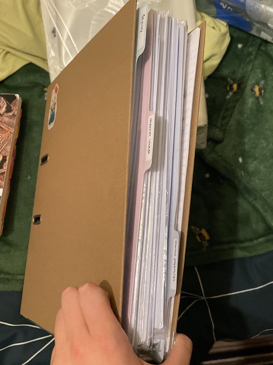 wolverot's tweet image. organised my first year classics notes into an arch lever folder … it barely all fits … eye twitch …