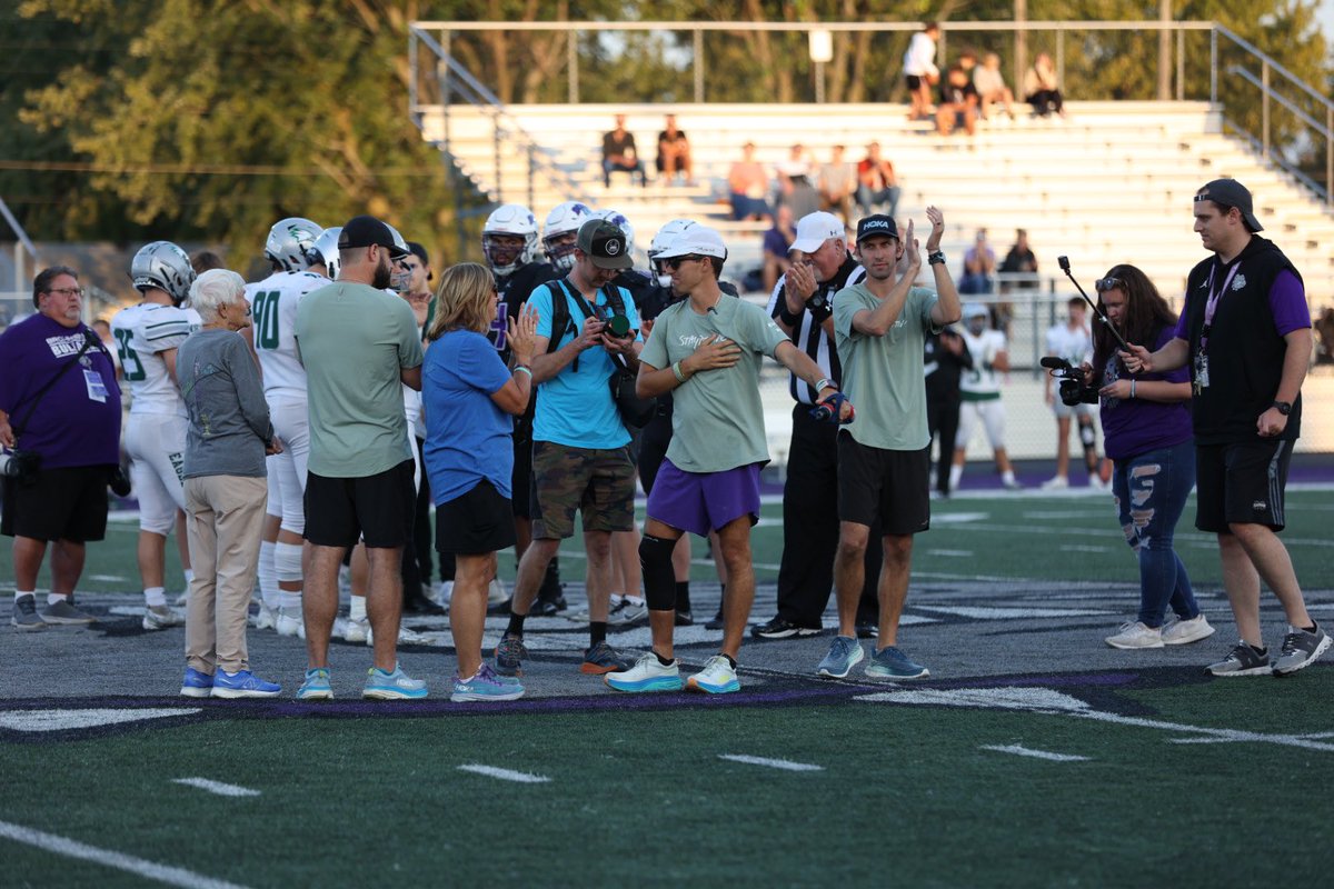 bhsdogs's tweet photo. At tonight’s coin toss we celebrated the life of long-time Bulldog friend, Ralph Hartnagel.

Joined by the Hartnagel family and son Michael who stopped by Roark Stadium on his run across Indiana to raise funds for cancer research.

#StayPositive https://t.co/7FtcvK0Lbn