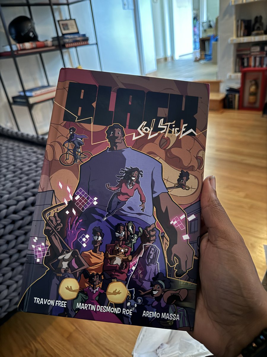 Travon's tweet photo. There's something very cool about holding a copy of your first print graphic novel. (You can too in December!) #BlackSolstice https://t.co/eiTST0jcyt