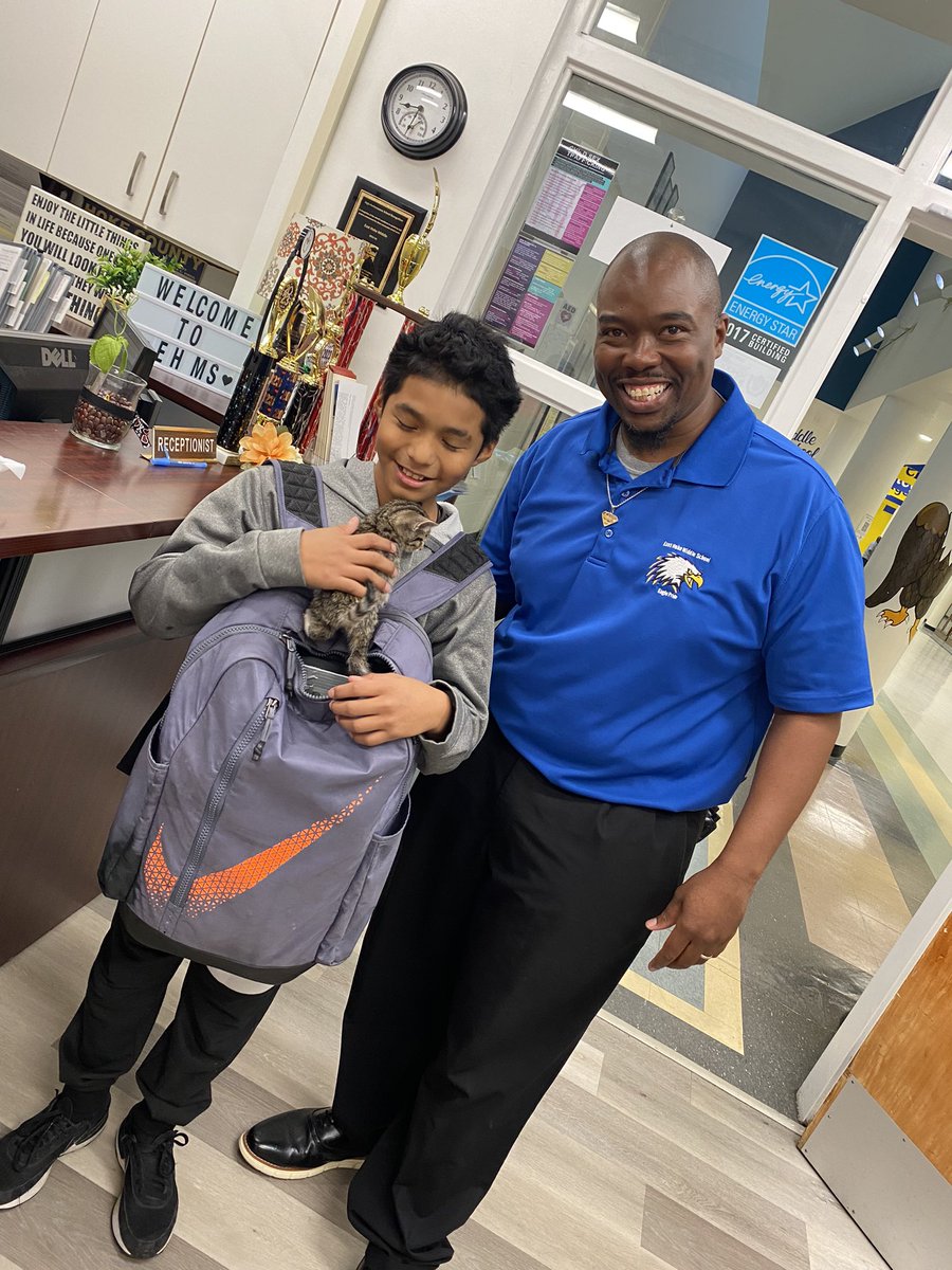 amcovington05's tweet photo. Who let the “cat out of the bag”? A pleasant surprise this morning for a 6th grader that has a stowaway hide out in his backpack. A little sunshine on a tough morning @EHMSEagles. @HokeCoSchools https://t.co/3gjWtL88O2