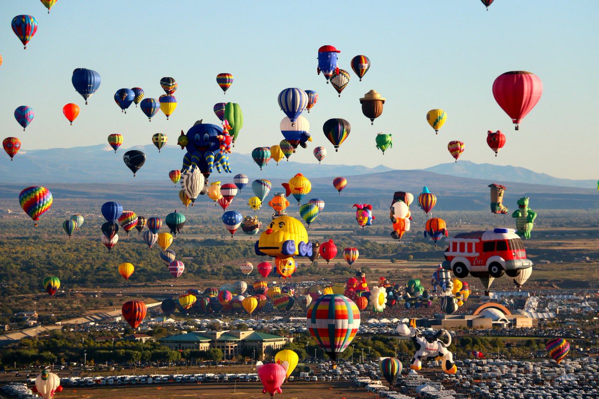 CD3Gator's tweet photo. New Mexico’s blue skies permeate views of Special Shape &amp; Colorful Hot Air Balloons &amp; this year at the 51st Albuquerque @balloonfiesta they’ll Showcase a rare Ring of Fire Solar Eclipse on October 14th at 10:34 AM MT. 
NASA will livestream the event!
#BalloonFiesta 
✨💫🔥☀️⛰️🤩 https://t.co/DWJaRnemEE