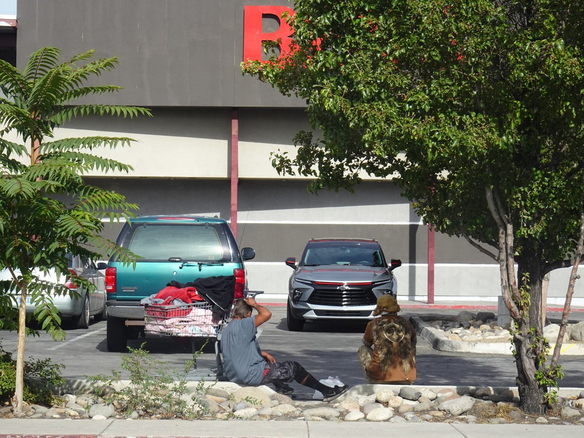 OurTownReno's tweet photo. The morning hustle for our neighbors without stable shelter in downtown Reno and the things they carry. A series of #renostreets #downtownreno #streetphotography from September 2023.  #helpeachother #helpourneighbors More on our IG BiggestLittleStreets or our Facebook https://t.co/9MfdnWgQow