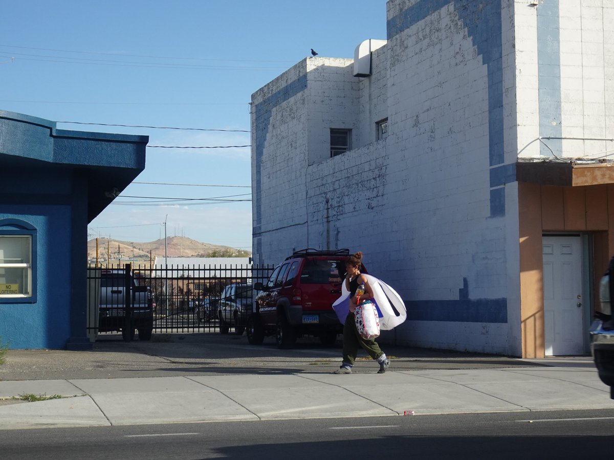 OurTownReno's tweet photo. The morning hustle for our neighbors without stable shelter in downtown Reno and the things they carry. A series of #renostreets #downtownreno #streetphotography from September 2023.  #helpeachother #helpourneighbors More on our IG BiggestLittleStreets or our Facebook https://t.co/9MfdnWgQow