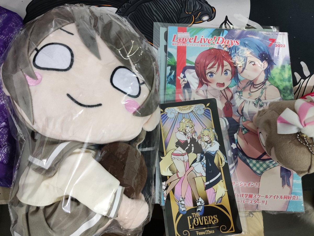 NeruZone's tweet photo. Finally got home from #Cosmania2023 😵‍💫

As expected, @YuriGL_PH siphoned most of my funds but it was all worth it! 
(Love Live Days was not part of the budget but it was hard to resist ShikiMei cover 😭) https://t.co/qP0FSVAG7z