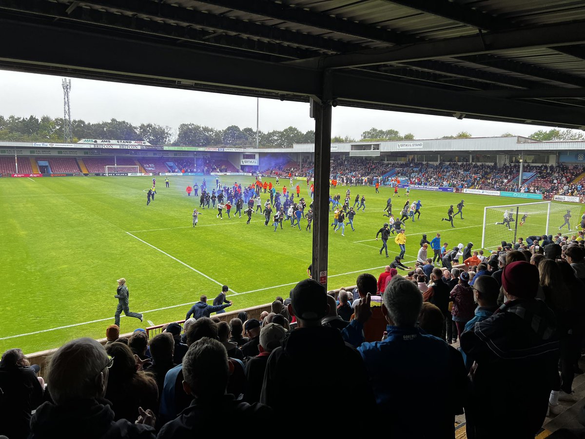mgell1s's tweet photo. If this is the end, it’s a bad way to go. Pissing rain and a mindless pitch invasion. Let’s hope there’s more to the story than this. Iron forever. #UTI https://t.co/r0nctXBXVC
