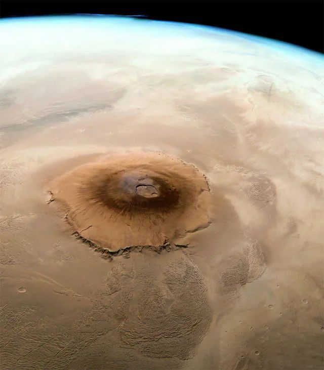 AstroBytez's tweet photo. Olympus Mons, the largest known volcano in the Solar System, as captured by ESA's Mars Express spacecraft https://t.co/cFD1FvrQFI