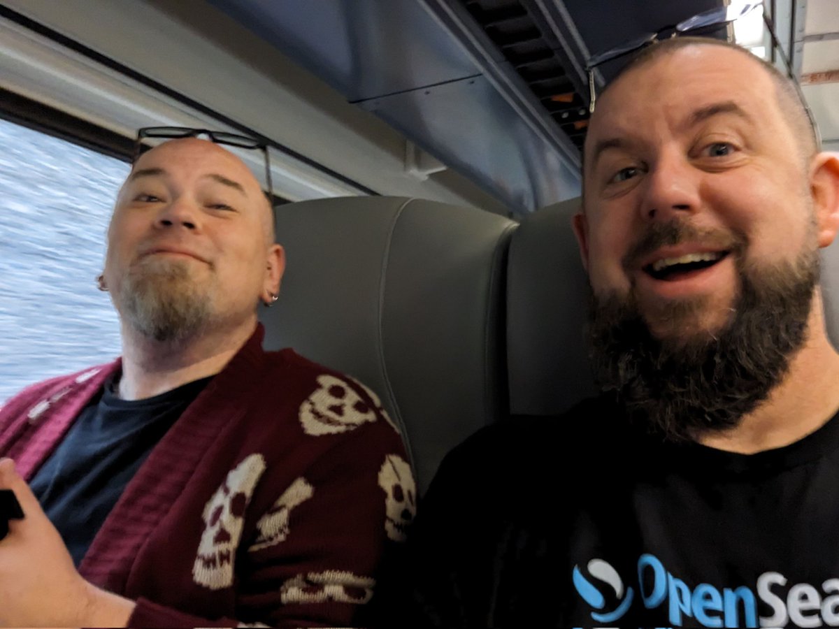 Two tired goofs heading home after a fun week at #OpenSearchCon