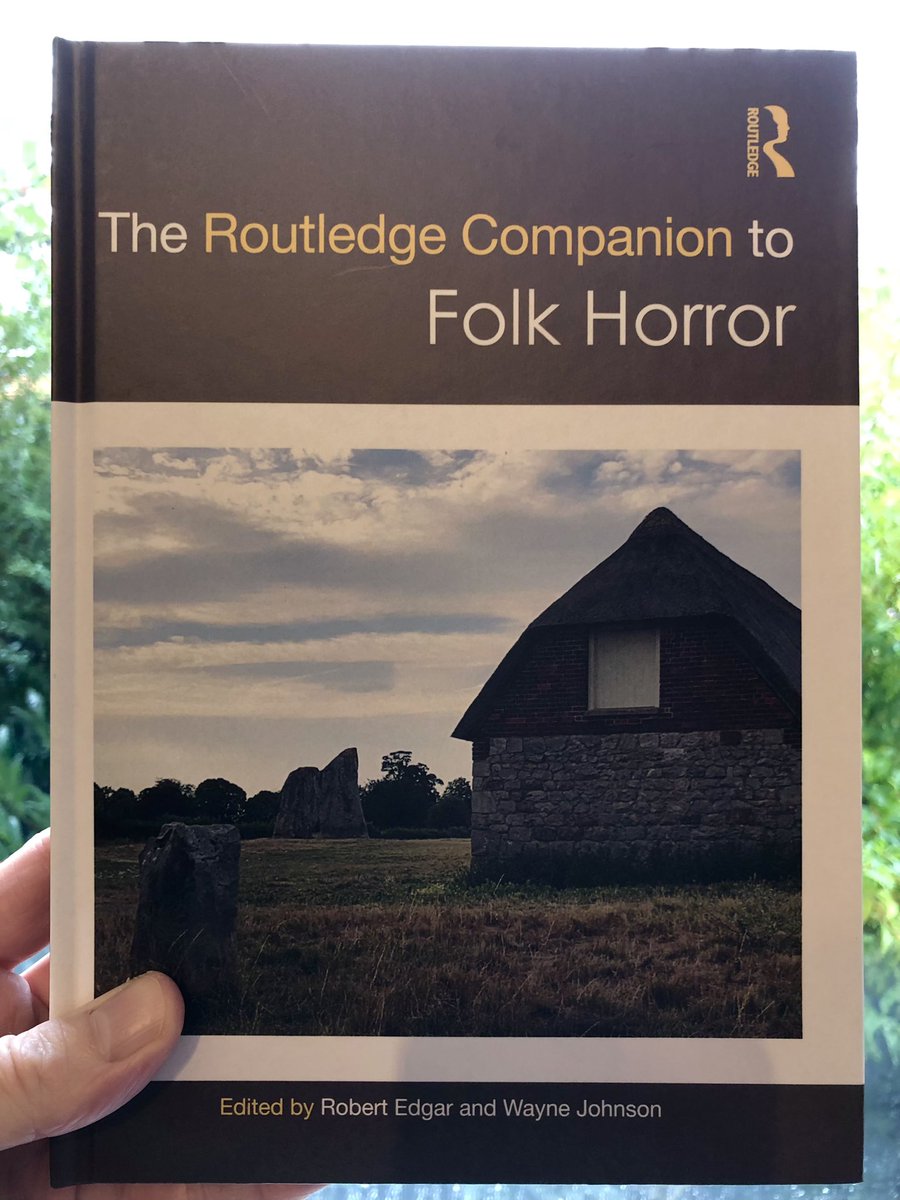 BenHalligan's tweet photo. Thrilled to receive a copy of the *enormous* new @routledgebooks "Companion to Folk Horror" @RobCEdgar; my chapter on @genesis_band, taking in 
#DavidBowie #JethroTull @CharterhouseSch 
#LedZeppelin #JimmySavile #BenDover #DHLawrence #MarkFisher #Machynlleth #hogweed #OssieClark https://t.co/3PGU4WV5ys