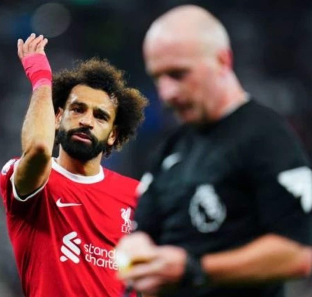 FCSALAH11's tweet photo. Last time, Mohamed Salah received a yellow card in the Premier league.

Guess the referee ?? https://t.co/FikjekFgmy