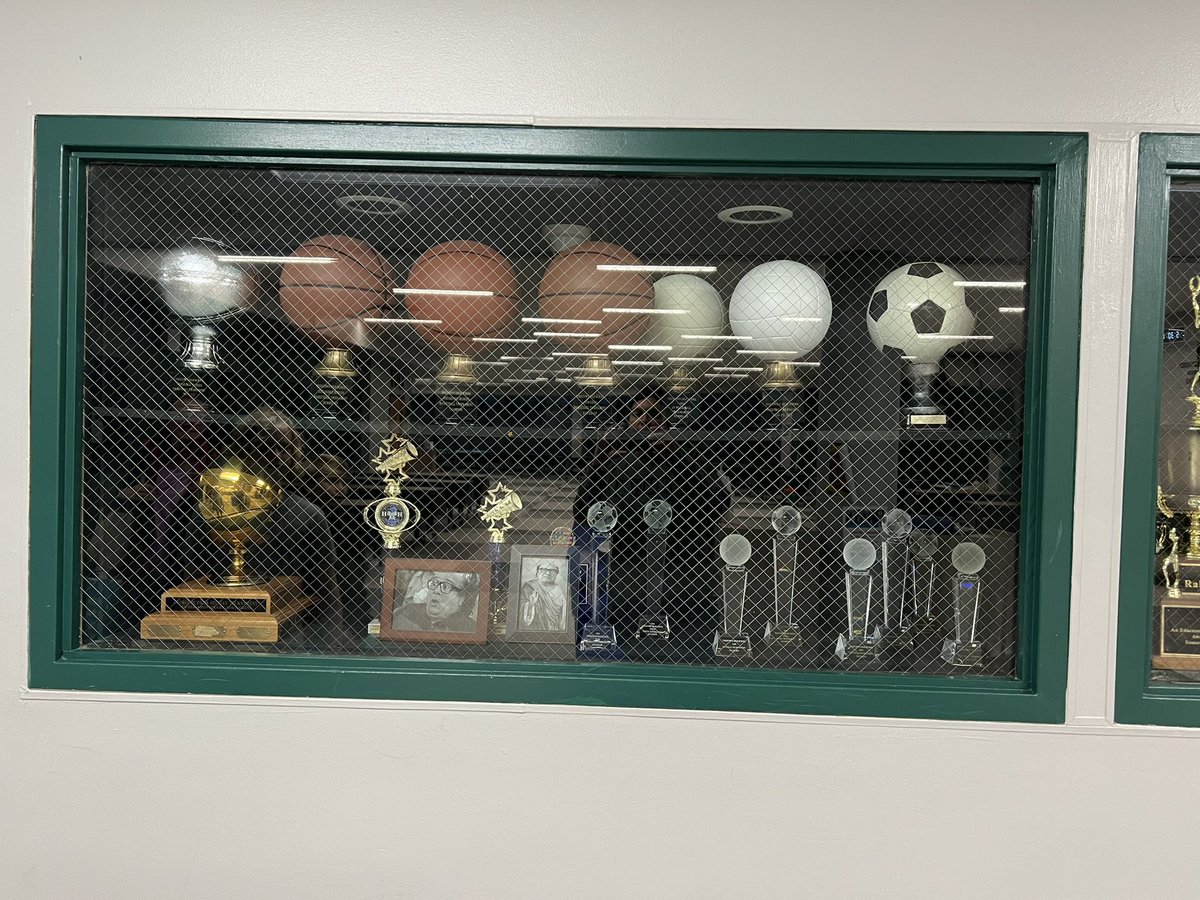 Natasha_Allison's tweet photo. @YHSDeGennaro I need to know the story of how @DannyDeVito ended up in the trophy case… 🤣 https://t.co/AXWrHrNQaE