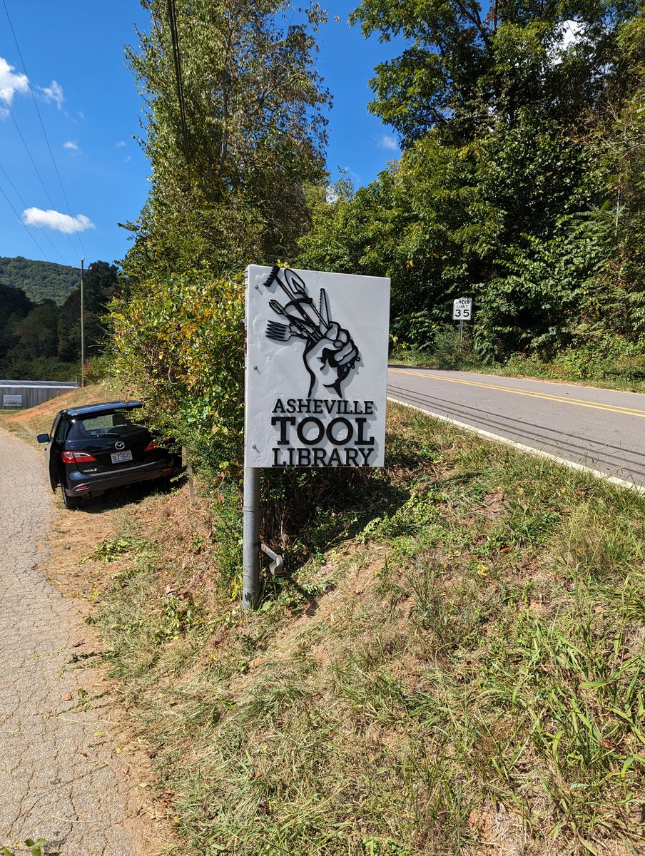 Jittery's tweet photo. Before and after: I made a new sign for the #Asheville Tool Library — an amazing resource in our community. (I did have to relocate the speed limit sign to the other side.) https://t.co/CEzsfyg9cg