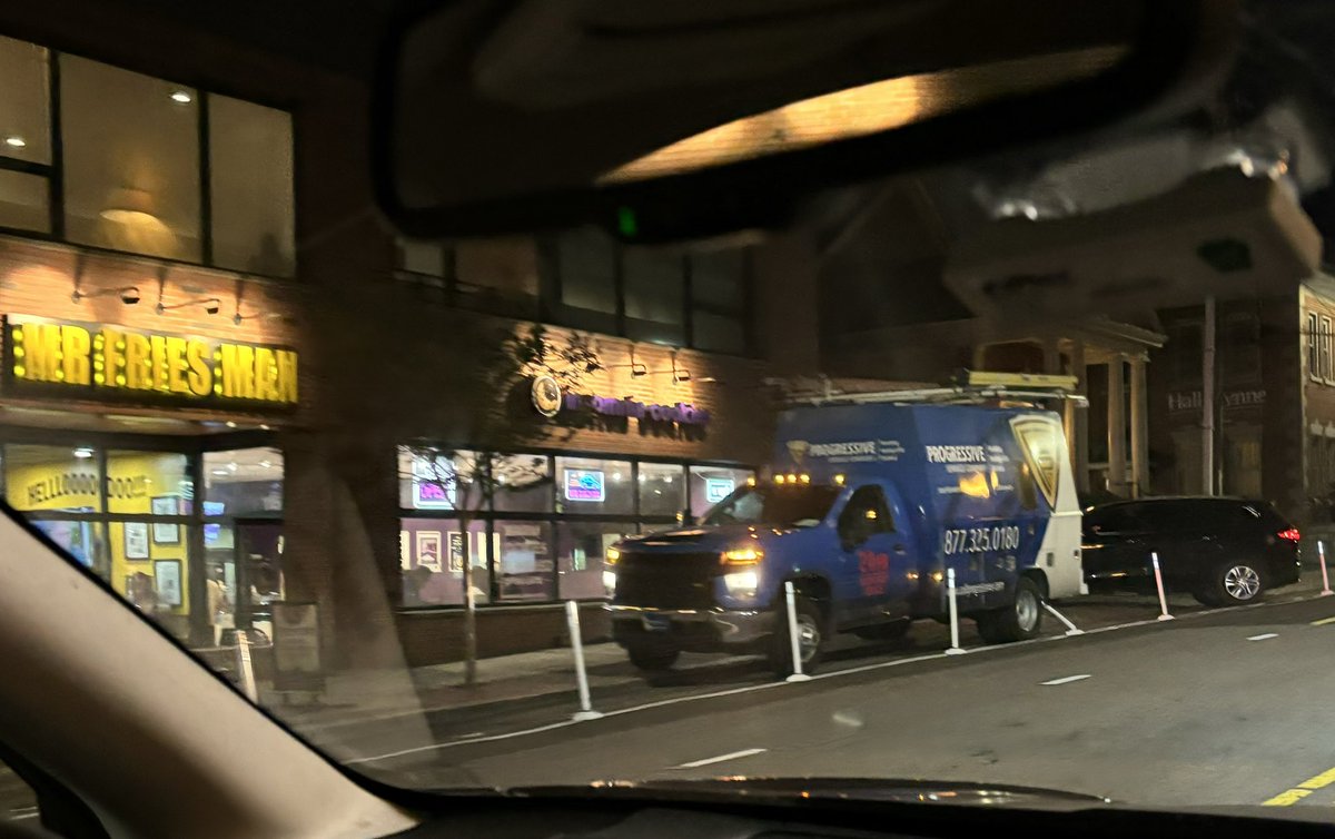 New protected bike lane on Main by Mr. Fries Man and Insomnia is working great 😒 (there were two MORE cars blocking it just before I took this) #durham