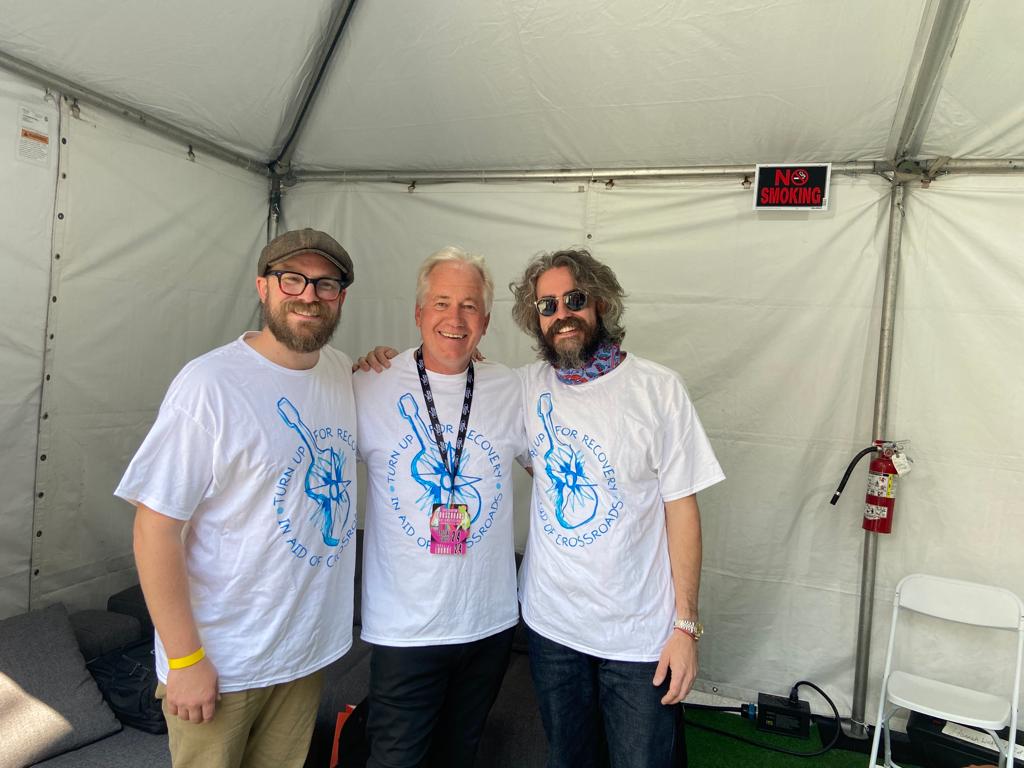 turnup4recovery's tweet photo. @WheresEricNews  roving reporter Tony, caught up with NEW #TUFR #ambassadors @thebroslandreth  #backstage at the #CrossroadsGuitarFestival Village Stage &amp; flew the flag for #TurnUpForRecovery with them, well wears the tee-shirt actually, flags nexttime maybe? https://t.co/JHBqvG2jmC