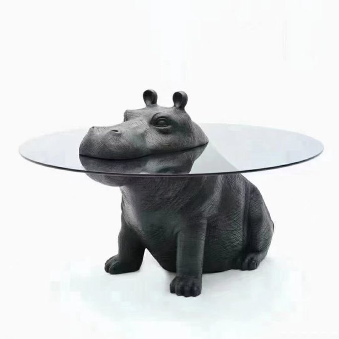 Mygatobarks's tweet photo. my bf knew of a guy who got killed by a hippo and refuses to let me even joke about getting this table https://t.co/KcKKW9vS6a