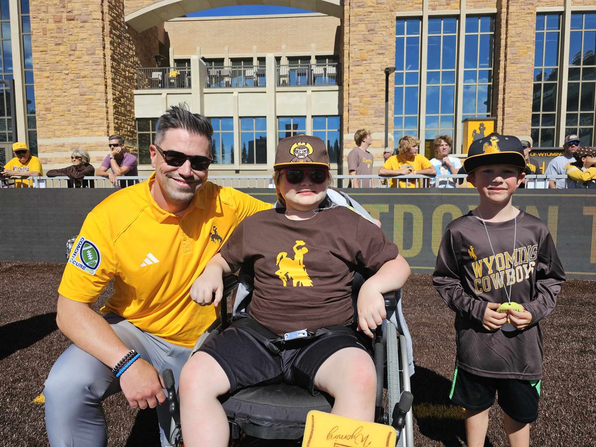 My grandson with Coach Haug on Coach to Cure MD day. Yesterday was a very special day for Bain. He really enjoyed it. Thank you <a href="/wyo_football/">Wyoming Cowboy Football</a> #GoPokes