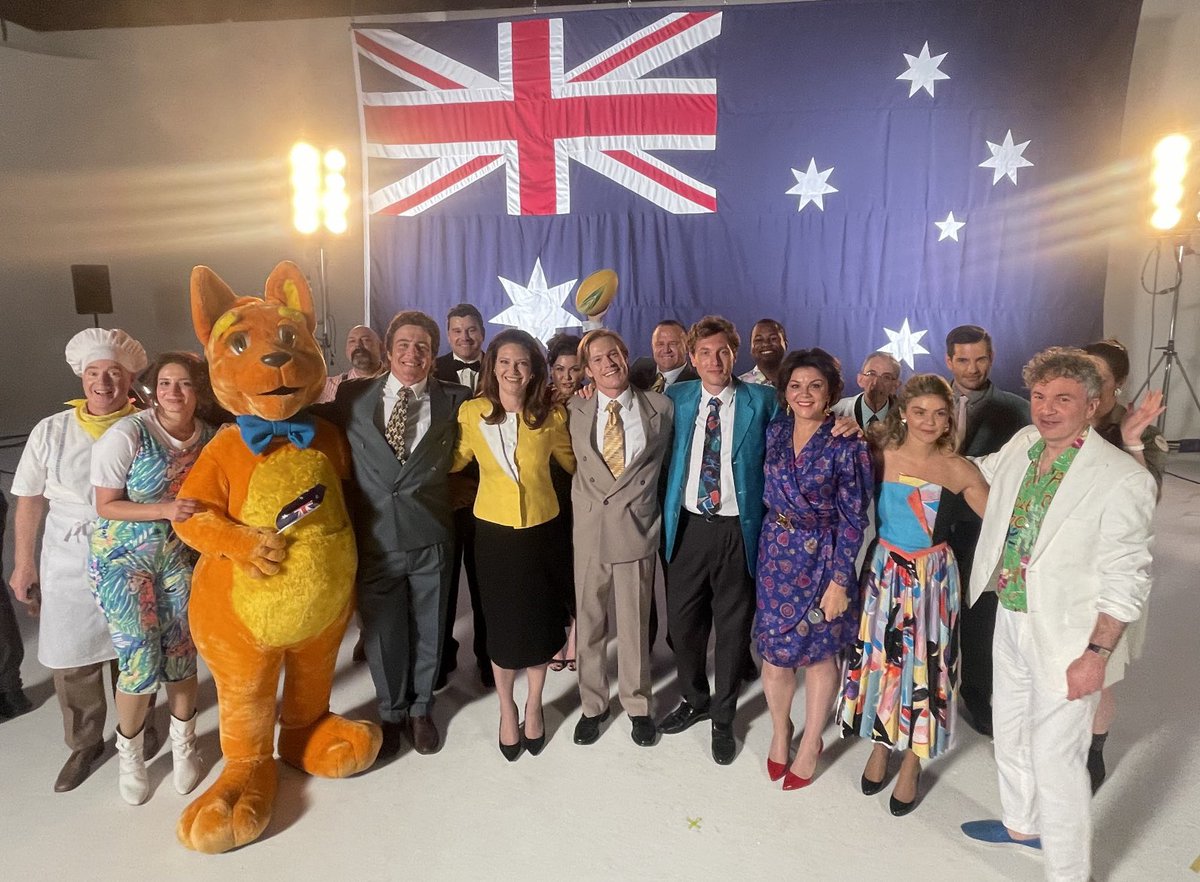 We cast the ‘network stars’ in this promo with several real media stars of 2023… among them <a href="/SciNate/">Nate Byrne</a> <a href="/danieldoody101/">Daniel Doody</a> <a href="/MeganHustwaite/">Megan Hustwaite</a> and of course… a certain Australian Idol finalist, Em Rusciano. That’s our genius composer Cornel Wilczek in the white suit. #TheNewsreader