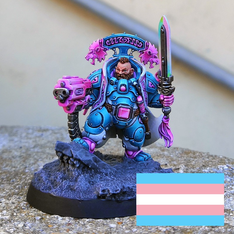CerberusXt's tweet photo. The League of Votann join my Trans pride series, a series where I paint one mini from each of the Warhammer40k factions using the Trans pride color scheme ! Big up @Sughammer for her prismatic blade tutorial, perfect for that scheme ^^ #WarhammerCommunity https://t.co/W6yZMkDO3U