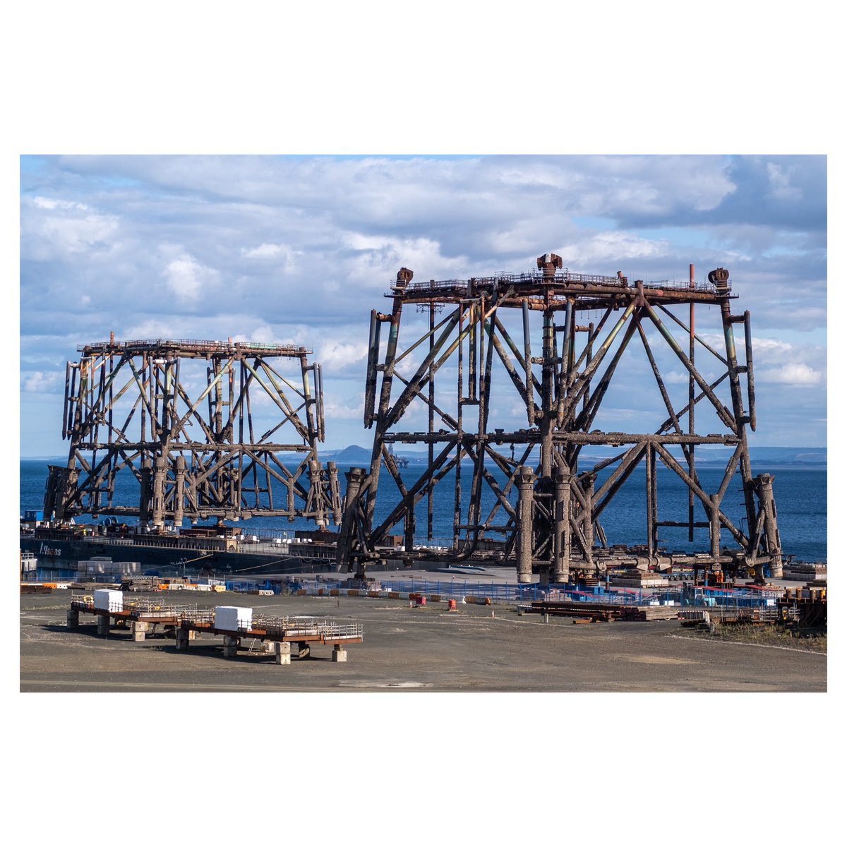#oilrig dismantling at #methil #shipyard all that’s left are the rusted platforms.  #firthofforth #explorescotland #eastfife #scotland #landscapephotography #industriallandscape