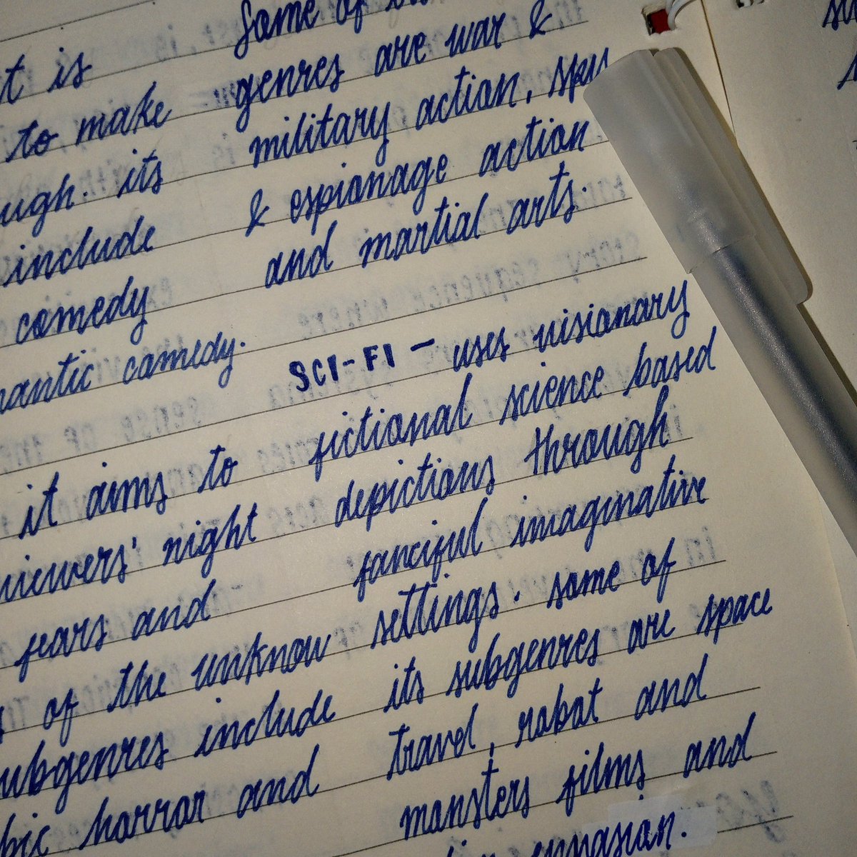 my blue pen with my ugly cursive handwriting 🤪