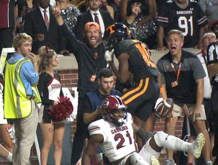 wvltrick's tweet photo. He's a baseball coach and a college football fan! How about the reaction by Coach Vitello on Squirrel's big catch! @wvlt @Vol_Baseball @Vol_Football @Squirrel_Vol https://t.co/IwmPBWu2a5