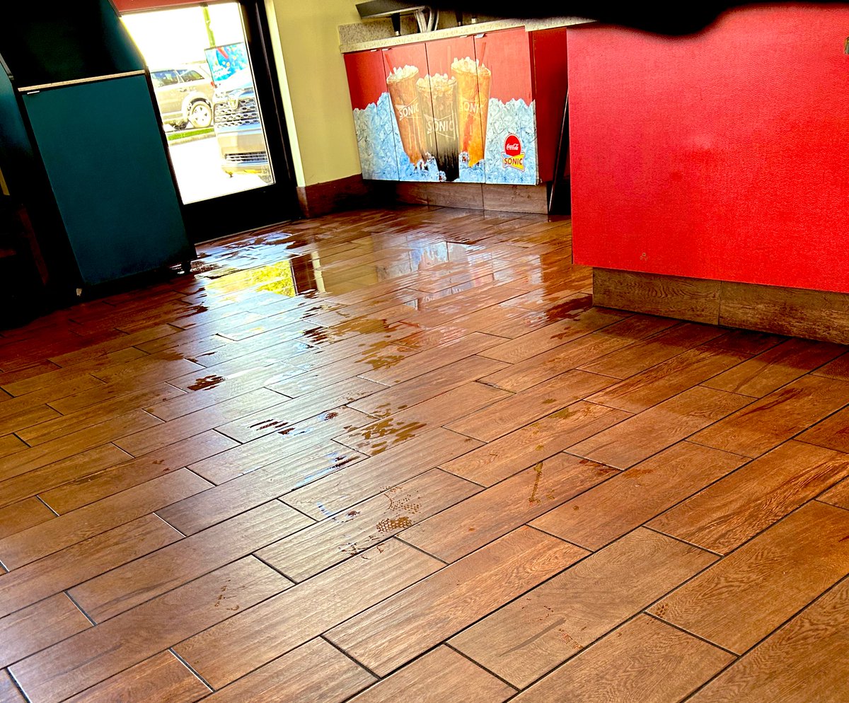 kathudson95's tweet photo. Went to @sonicdrivein and they had a wet floor with no signs on it and the employees walking on it. They made zero attempts to clean it up either. https://t.co/1dG3N3YTYn