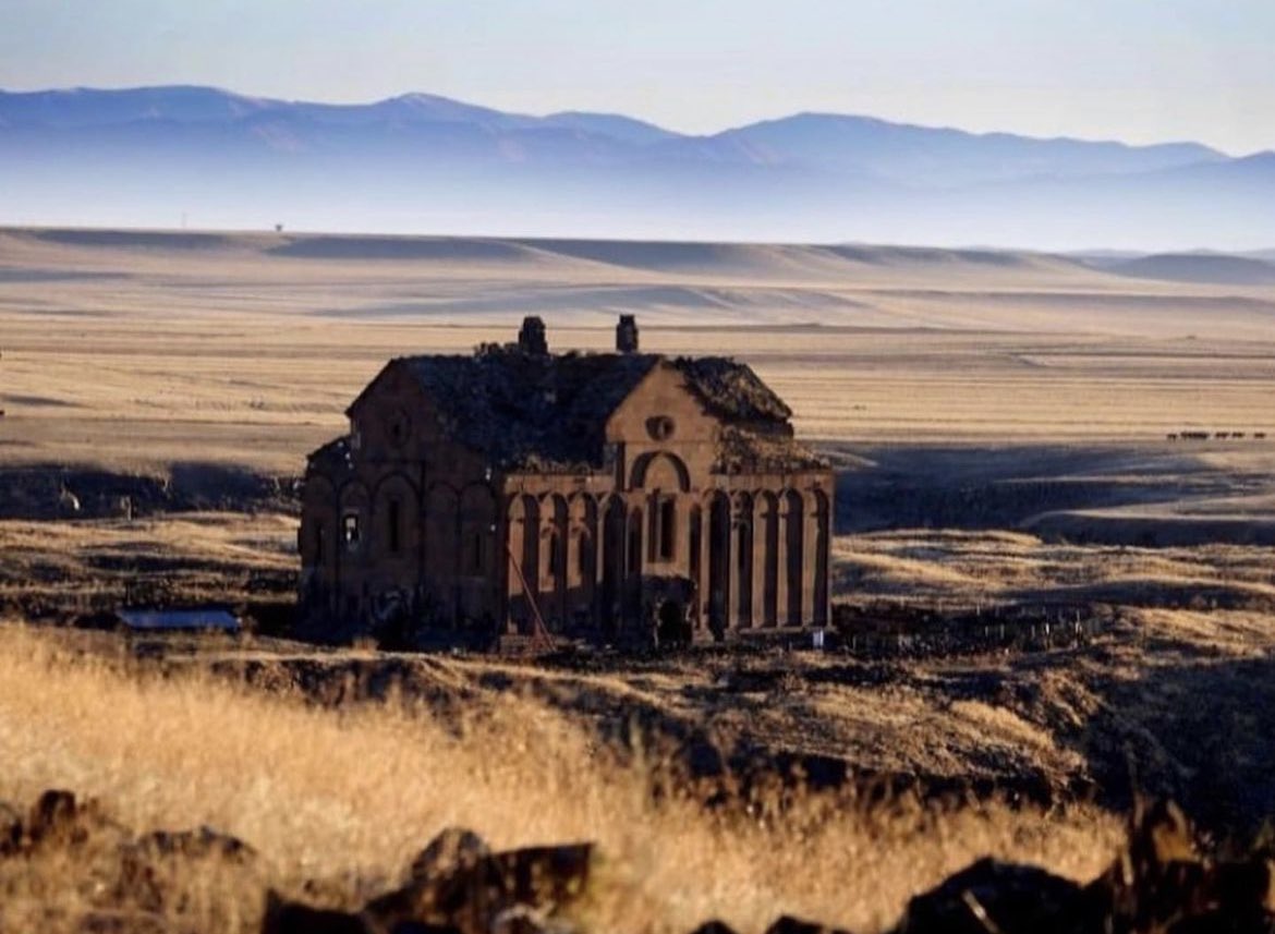 historyinmemes's tweet photo. The Abandoned Cathedral of Ani, built over a thousand years ago, stands in the ruins of the medieval capital of Armenia. It is the largest standing building in Ani, which was the capital of medieval Bagratid Armenia and is now located in present-day eastern Turkey. The cathedral was completed in 1001 AD under the patronage of Queen Katranidem. However, just five decades later, it was captured and converted into a mosque known as the Fethiye Mosque.

Over the centuries, the cathedral and the entire site of Ani endured periods of upheaval and dilapidation. This was exacerbated by the disastrous Mongol invasion in the 13th century, sacking of Ani, and three devastating earthquakes in the 14th century, 19th century, and as recently as 1998.

Ani, often referred to as the "World City," "City of 1,001 Churches," "Cradle of Civilizations," and "City of 40 Gates," is one of the earliest settlements, dating back to 3,000 B.C. Throughout its history, it saw the reigns of various empires, including the Saka Turks, Sasanian empire, Bagratid dynasty, Byzantine empire, Seljuk empire, Ottoman empire, and Russian empire.

The decline of Ani began in earnest in 1239 when the Mongols sacked the city and massacred its population. Subsequently, a 1319 earthquake caused the collapse of the cathedral's conical roof. As a result, Ani was gradually abandoned, and the church fell into disuse.

In 2016, UNESCO declared the Cathedral of Ani, along with the entire site of Ani, a World Heritage site, recognizing its historical significance and architectural beauty despite its state of abandonment and decay.