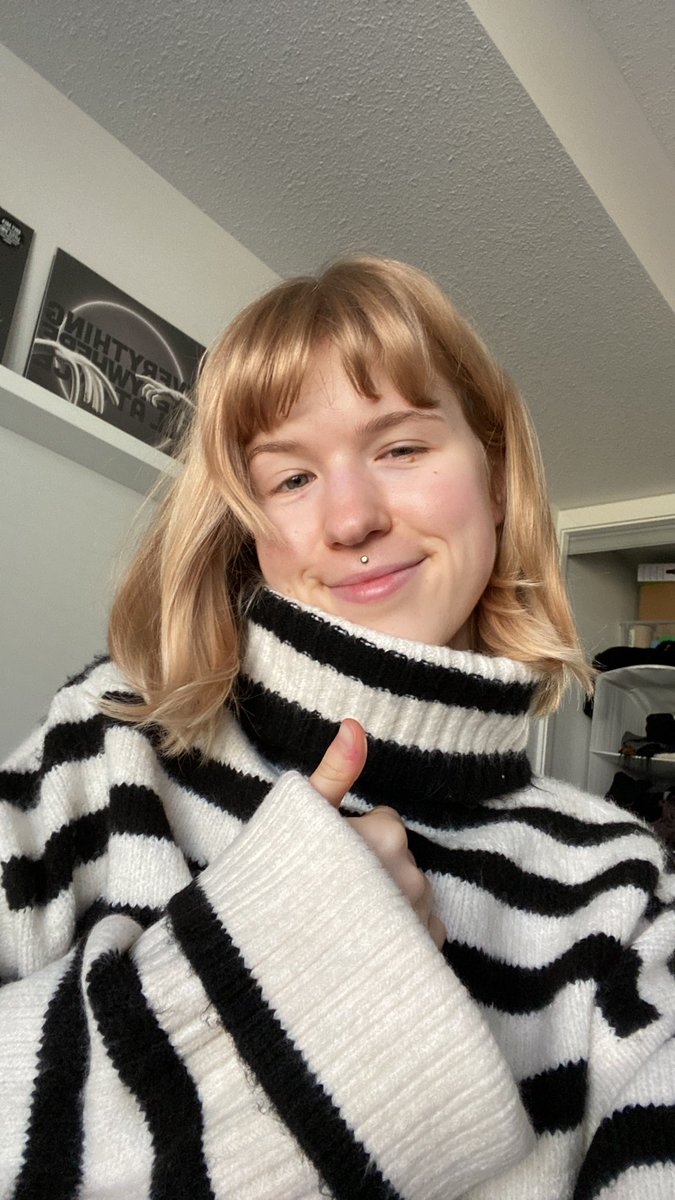 heartsssally's tweet photo. it’s me in my little sweater https://t.co/s2arDNQ02b