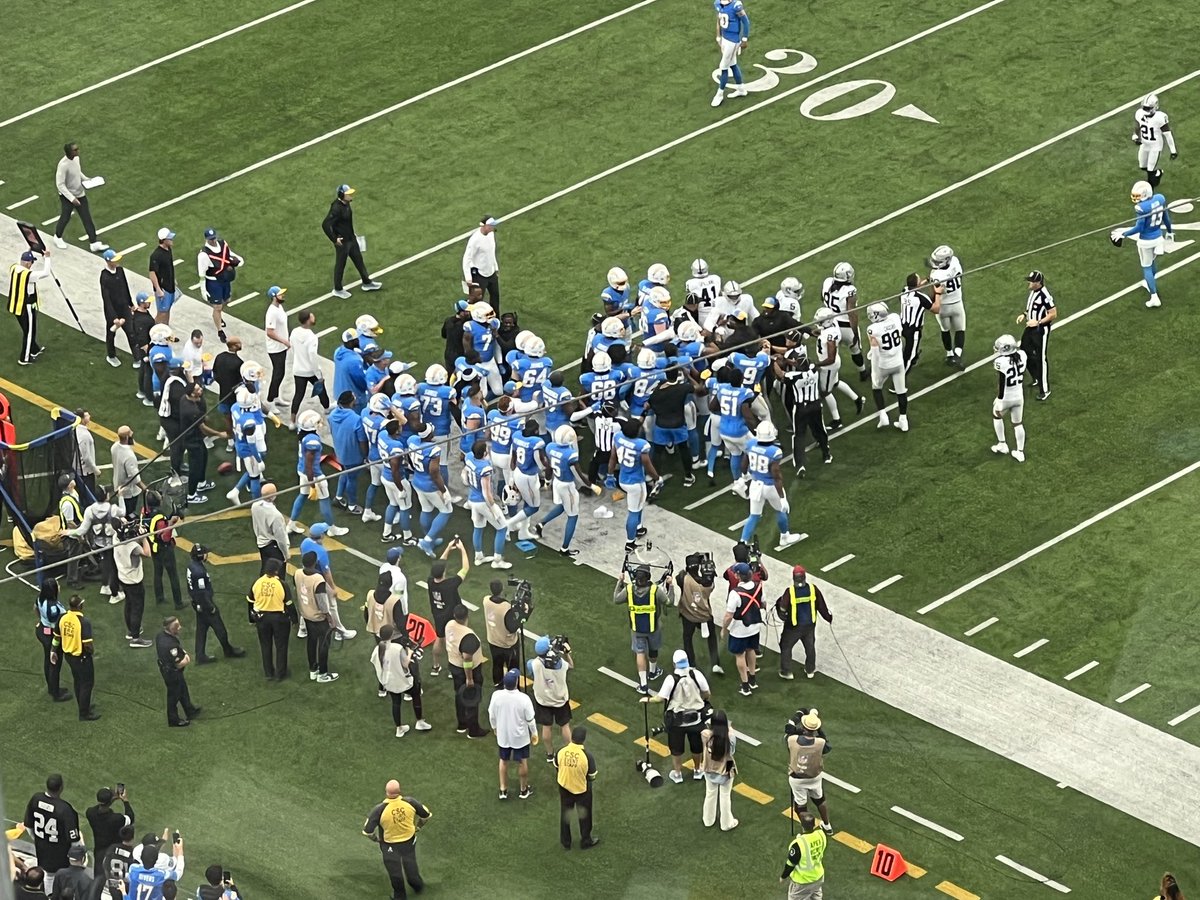 RealFRamirez's tweet photo. Jerry Tillery hit Justin Herbert late out of bounds. Chargers players come after him. Dirty play. 
#LVvsLAC https://t.co/NHFwwYiwya