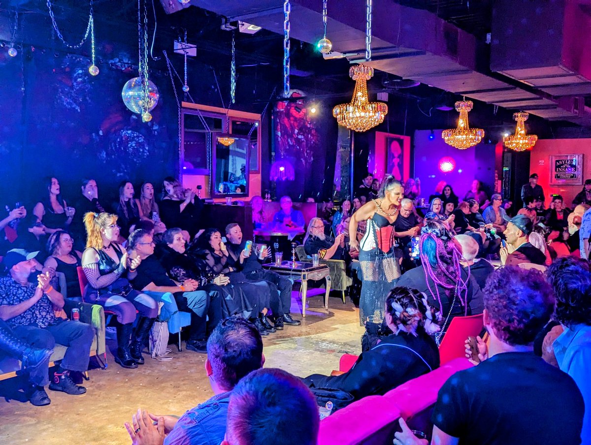 Goth_Bats's tweet photo. @PrettyGrungy The second look by @PrettyGrungy, modeled by Lola Corbitt. 

Her walk was interrupted with members of the crowd dowsing her with their drinks. 

Liquid changed the colour of this garment from pure white to blood red. https://t.co/ADAZqpN5RC