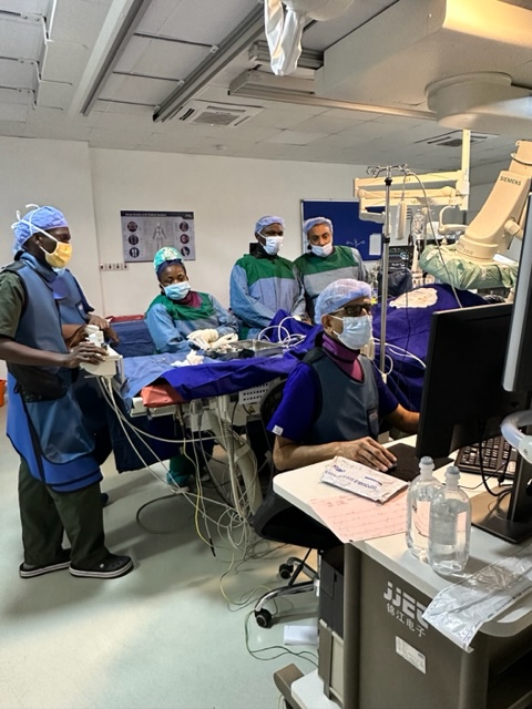 Here are Drs. Singh, Gandye, and Badwar doing a PVC ablation in JKCI in Tanzania this July! Our train forward mission teaches local medical personnel to perform procedures like this after we are gone. #madaktari #Africa #trainforward #Tanzania