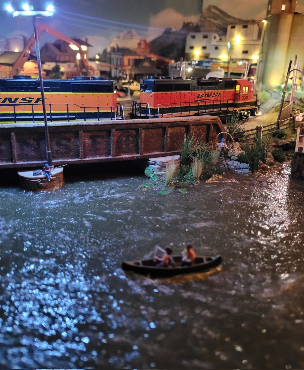 RegGFX's tweet photo. Plenty of night light life for boating and fishing at the o'l bridge train crossing.
@WoodlandScenics
#WoodlandScenics #waterscene #modelrailroad https://t.co/cbPi4qClFl
