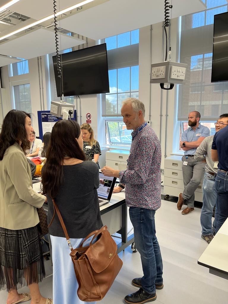 Members of the MSk lab discussing projects with potential students on the MRes Biomedical Research